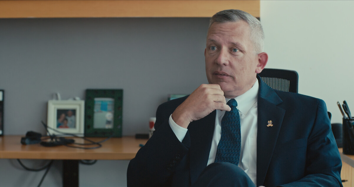 a lawyer sitting down for an interview