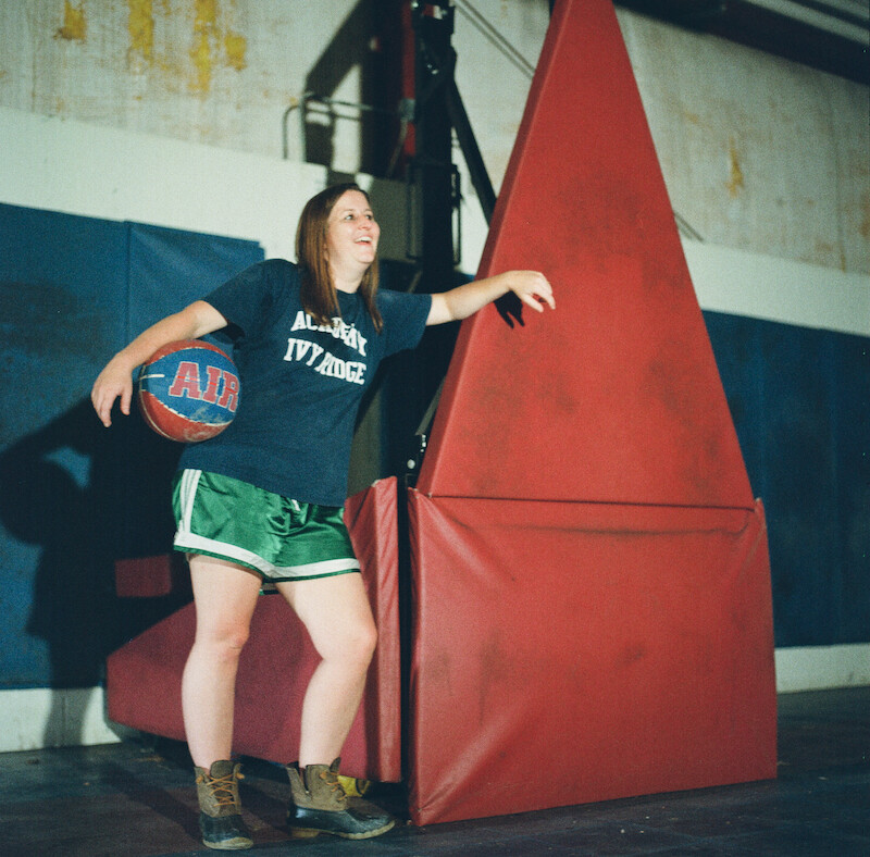 Katherine Kubler standing in front of a basketball hoop at Ivy Ridge. 