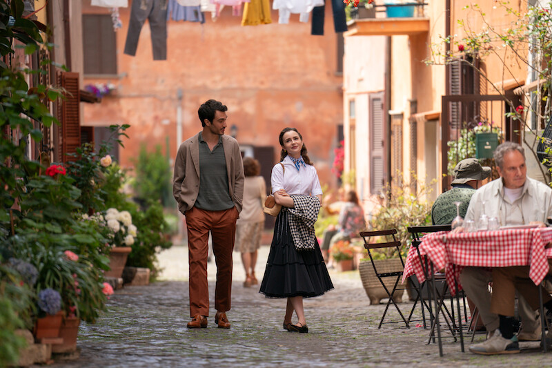 Eugenio Franceschini as Marcello, Lily Collins as Emily walk together in Season 4 of 'Emily in Paris'