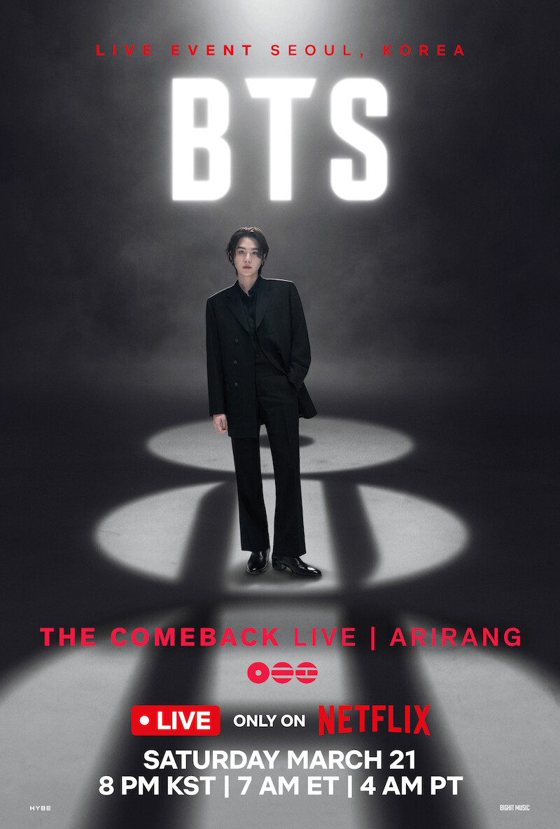 Suga in a black suit stands under a spotlight with misty lighting, BTS logo above them. Text announces BTS live comeback event in Seoul, streamed exclusively on Netflix, with date and time details.