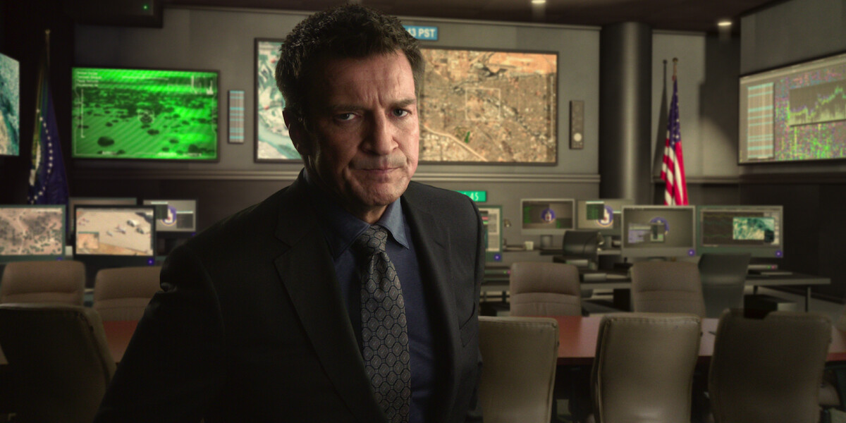 Nathan Fillion in a command center.