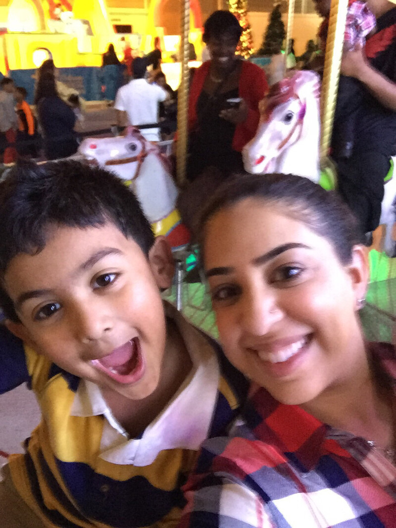 Aziz with his Aunt Rubina at ChristmasFest, December 2015.