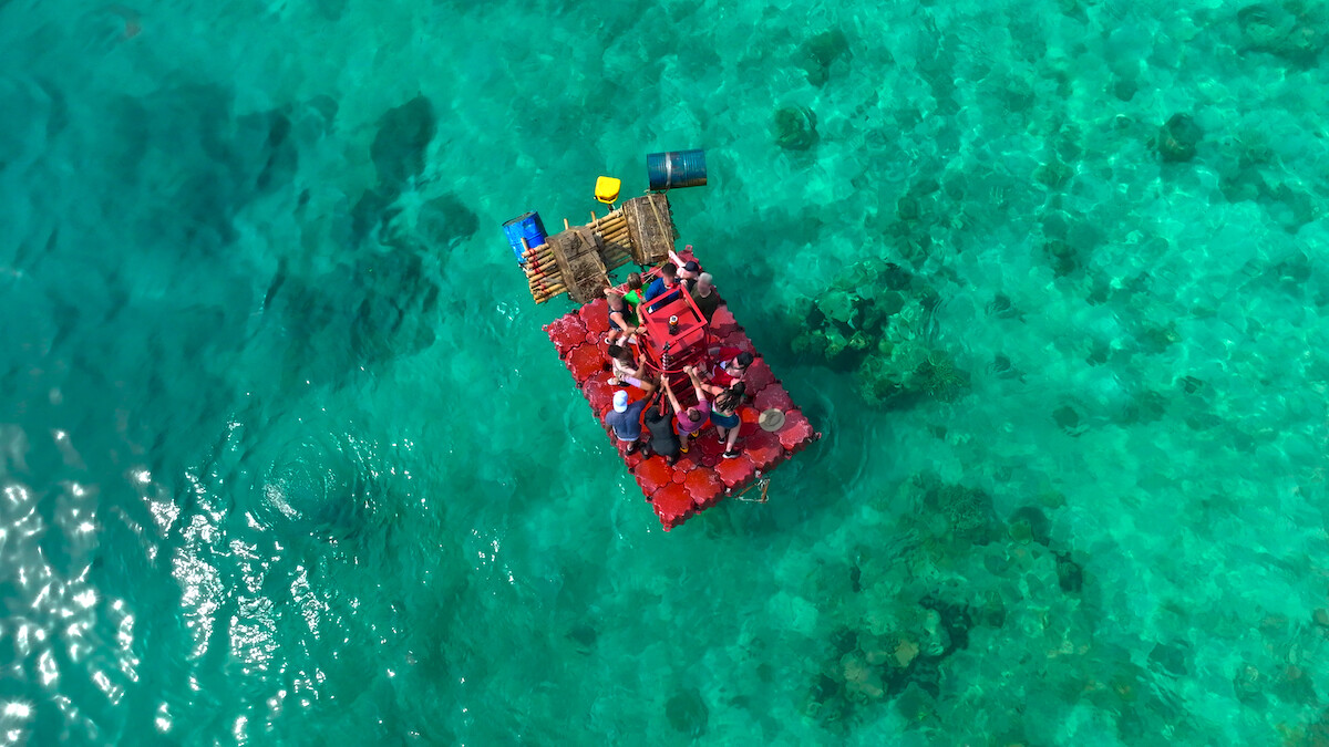 The contestants from 'The Mole' Season 2 on a raft.