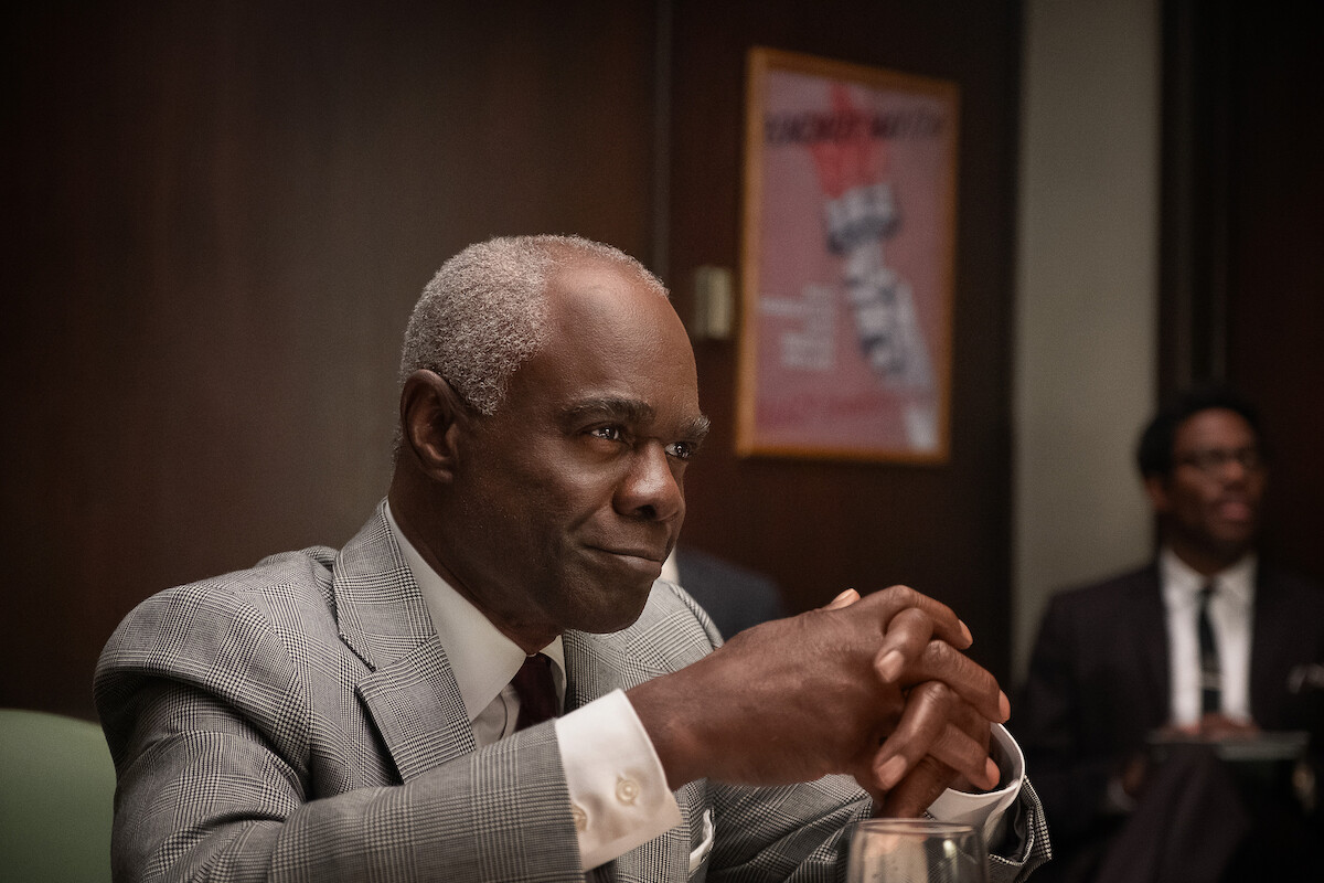 Glynn Turman as A. Philip Randolph sits with his hands folded in ‘Rustin’