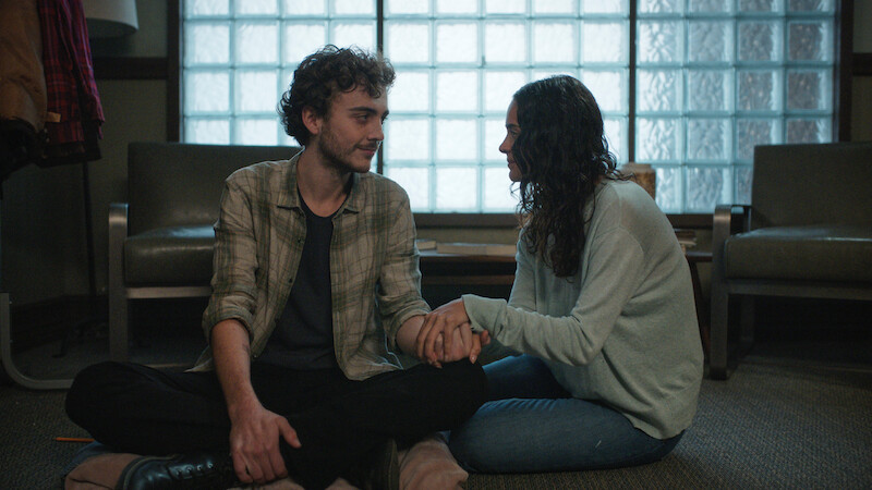 Two people sitting down