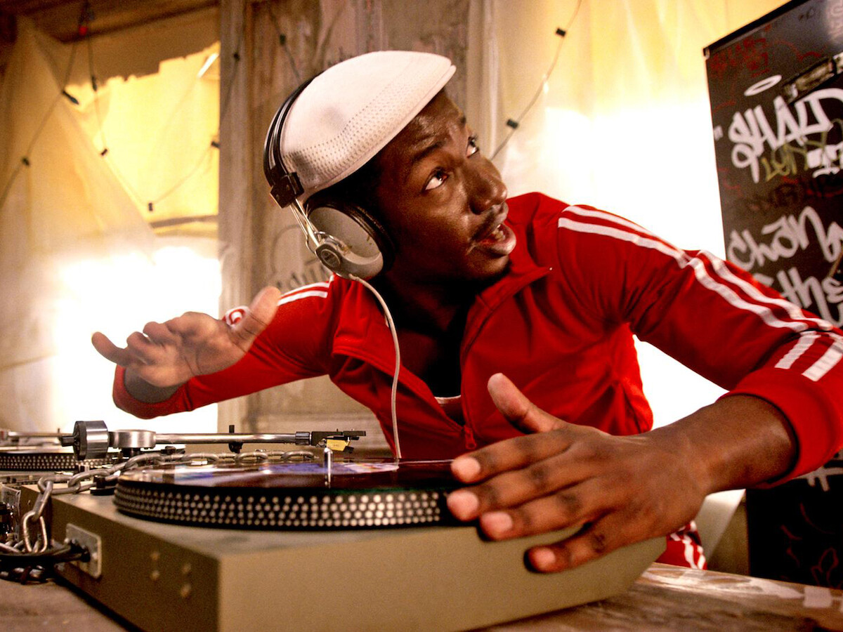 A close up of Mamoudou Athie playing character in the hip-hop film The Get Down