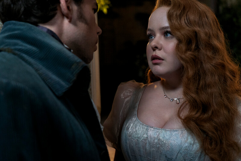 Luke Newton as Colin Bridgerton and Nicola Coughlan as Penelope Featherington in Season 3 of Bridgerton.