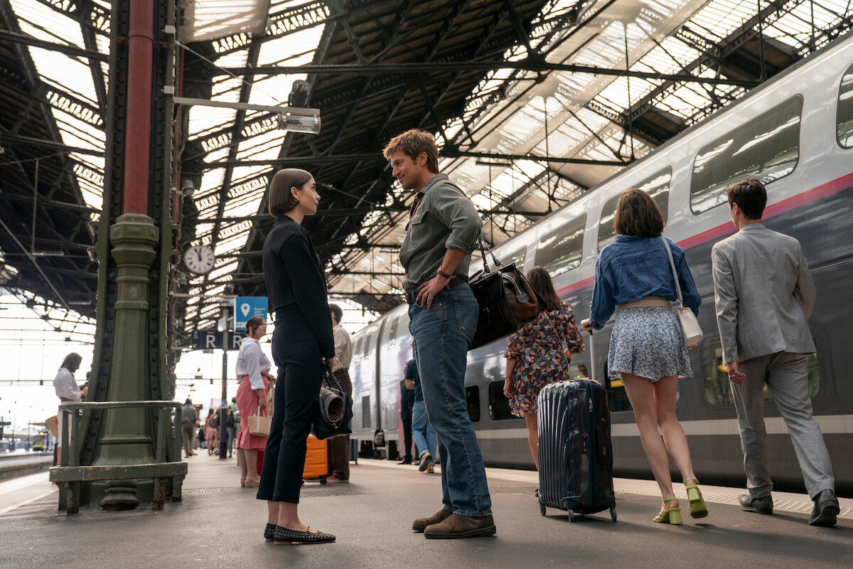 Lily Collins as Emily and Lucas Bravo as Gabriel in ‘Emily in Paris’ Season 5.