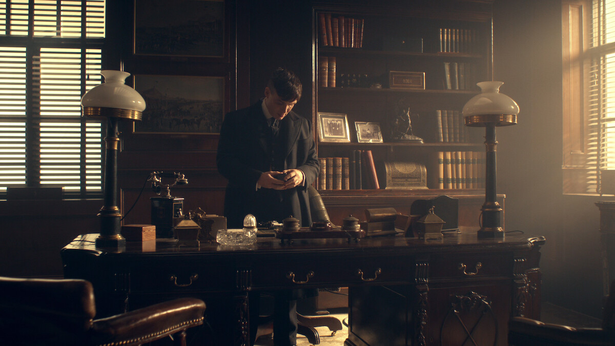 An image of Tommy Shelby in a boardroom, which is actually filmed in a Victorian warehouse in England