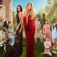 Group of elegant people posing outdoors in formal attire on a sunny day, with a large dog in the foreground, a mansion and champagne, lush green lawn, some taking selfies, creating a sophisticated and glamorous garden party scene.
