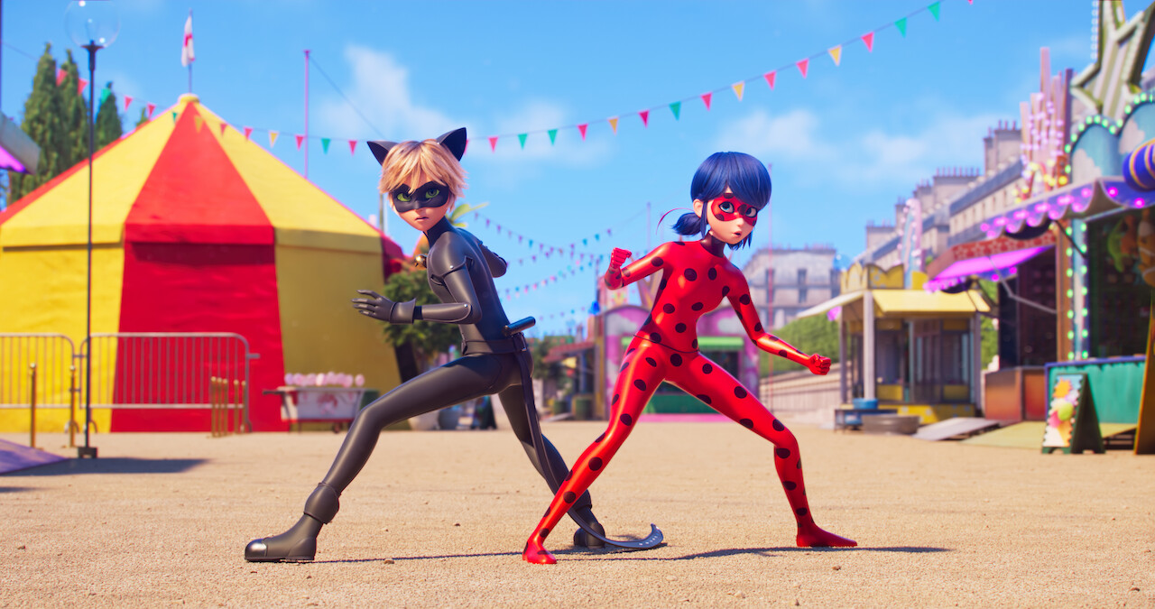 Two illustrated figures standing at the entrance of a fair. One is dressed like a cat, the other as a ladybug.