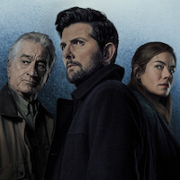 Three serious-looking adults stand close together in front of a moody, blue-gray textured background, dressed in dark coats, suggesting a dramatic or suspenseful setting.