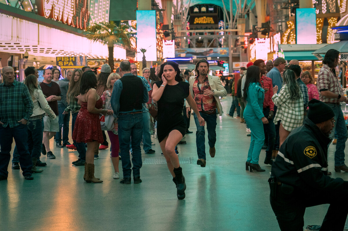 Shelley Hennig as Ava Winters, Nick Zano as Chad McKnight run through Las Vegas together in Season 1 of 'Obliterated.'