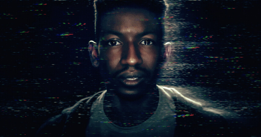 An image of Mamoudou Athie playing Dan Turner in Archive 81
