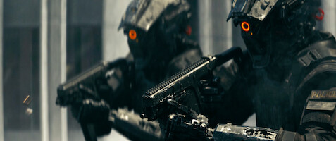 Two policemen in full body armor hold guns in 'Code 8'