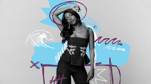 Woman posing against a plain backdrop, wearing a stylish black outfit with floral designs, surrounded by colorful abstract doodles like waves, scribbles and shapes, creating a modern artistic setting.