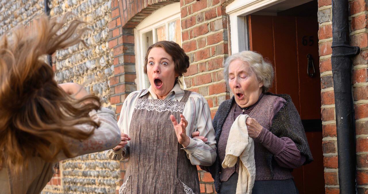 Olivia Coleman as Edith Swan opens her mouth widely with a surprised expression in 'Wicked Little Letters'