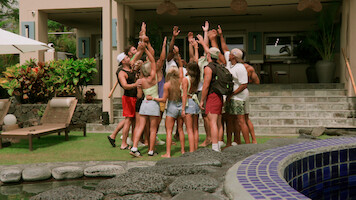 Peter Cipriano, Braeden Holliday, Scarlett Bentley, Shyanne Blankenship, Kaylee Needham, Bradley Bobbit, and Clint Smith in summer clothes stand in a circle with raised hands outside a modern villa, surrounded by greenery, lounge chairs, and a pool.