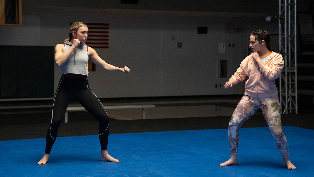 Peyton List as Tory Nichols and Mary Mouser as Samantha LaRusso in Cobra Kai.