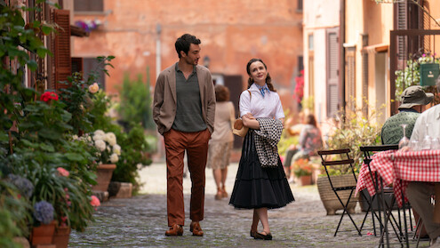 Eugenio Franceschini as Marcello and Lily Collins as Emily walk together in Rome 'Emily in Paris'