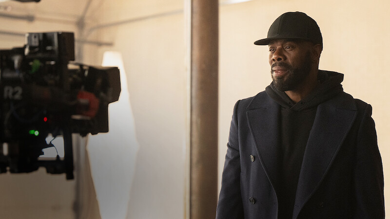Behind the scenes image of a camera filming Colman Domingo in Season 1 of 'The Madness'