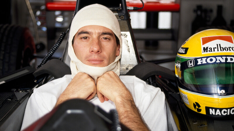Ayrton Senna in the driver's seat of his Honda Marlboro McLaren McLaren MP4/6 Honda RA121E 3.5 V12 racing car with his custom racing helmet during testing in Jerez, Spain, circa February 1991