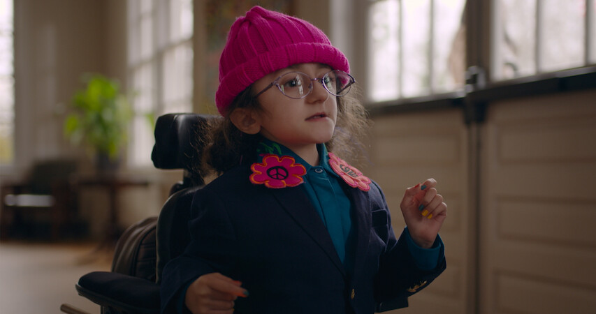 Esperanza in a pink hat