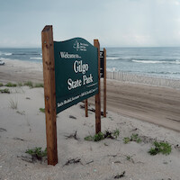 Gilgo State Park sign on the beach
