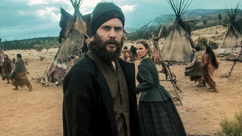 Taylor Kitsch as Issac and Betty Gilpin as Sara Rowell in 'American Primeval'