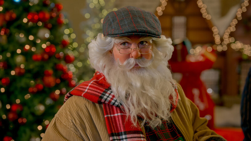Alexandra Breckenridge dressed as Santa in ‘My Secret Santa.’