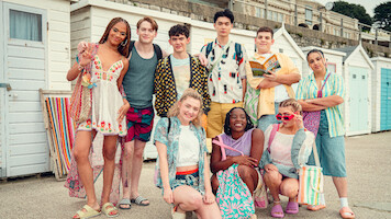 The cast of Heartstopper Season 3 playfully pose together. 
