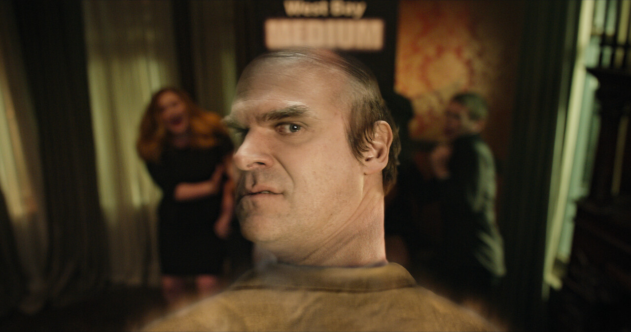 David Harbour as semi-translucent ghost, Ernest