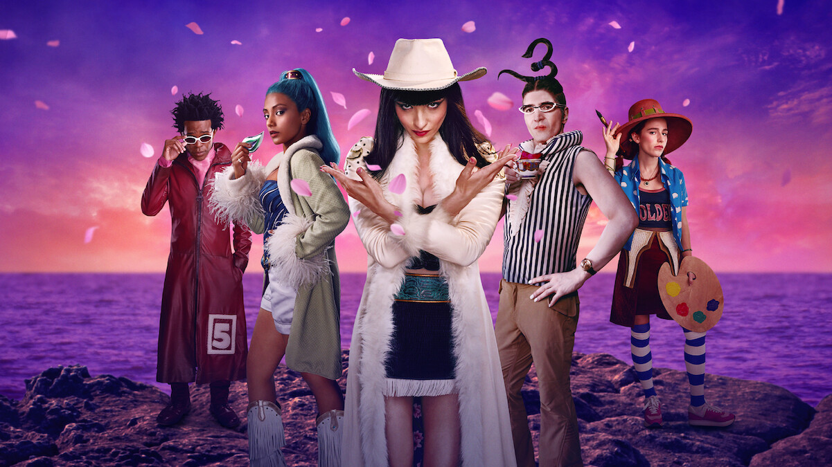 Baroque Works, five people in colorful, eccentric costumes pose confidently on rocky ground with a vibrant purple and pink sunset sky behind them, creating a dramatic and playful fantasy atmosphere.