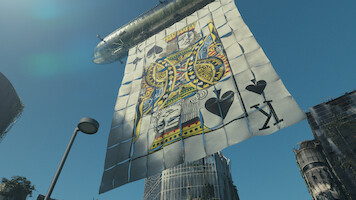 A giant King of Spades playing card banner is suspended beneath an airship, floating over a cityscape with modern and weathered buildings under a clear blue sky.