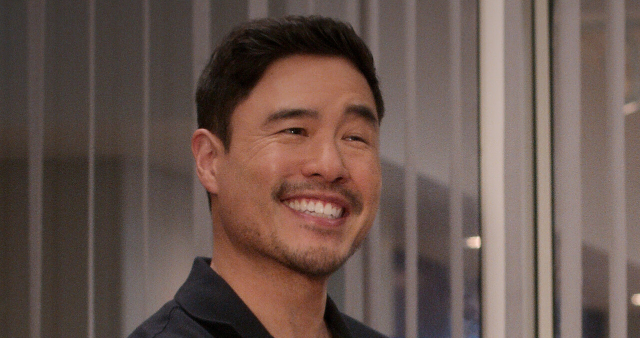 Man smiling with mustache