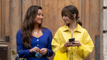 Emily in Paris. (L to R) Ashley Park as Mindy, Lily Collins as Emily in Emily in Paris. Cr. Stephanie Branchu/Netflix © 2024