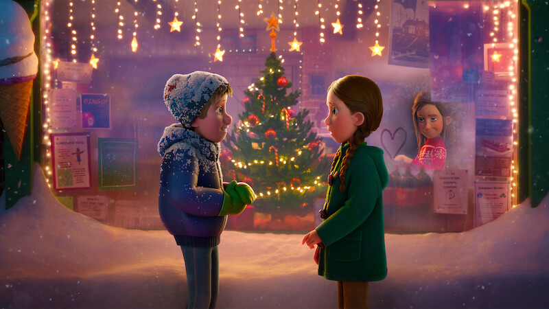 Instream still from 'That Christmas', featuring a young boy and girl in front a Christmas tree and Christmas lights.