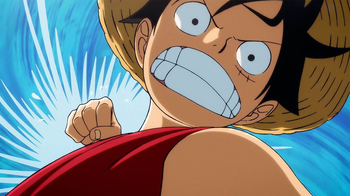 Animated character with a straw hat and red vest, showing an intense facial expression and clenched fist, with a blue swirling background, suggesting action or movement.