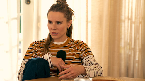 Kristen Bell as Joanne holds a microphone in 'Nobody Wants This' Season 2.