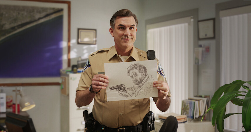 Paul Schneider as Officer Andy Boone in Florida Man Season 1.