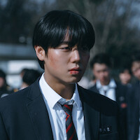 Park Ji-hoon with a bloodied lip wearing a school uniform in 'Weak Hero Class 2'