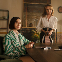 Lily Collins as Emily and Philippine Leroy-Beaulieu as Sylvie Grateau in ‘Emily in Paris’ Season 5.