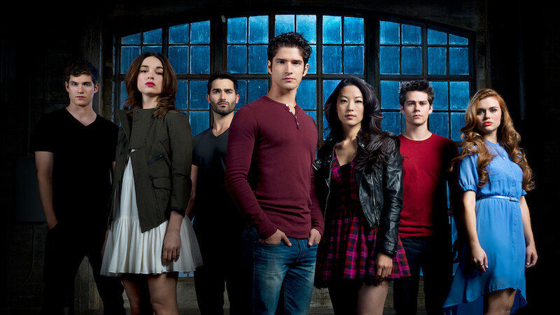 The Season 3 cast of 'Teen Wolf' stands in an abandoned warehouse.