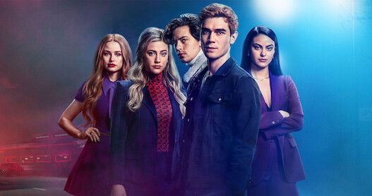 Madelaine Petsch as Cheryl Blossom, Lili Reinhart as Betty Cooper, Cole Sprouse as Jughead Jones, K.J. Apa  as Archie Andrews, and Camila Mendes as Veronica Lodge pose together in Season 7 of 'Riverdale.' 