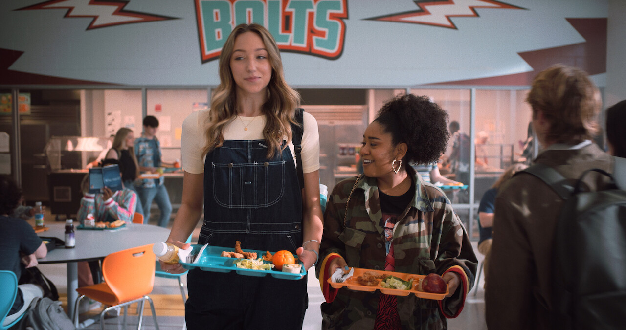 Jodi and Fareeda in the cafeteria getting ready to eat lunch