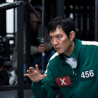 Lee Jung-jae as Seong Gi-hun filming on set in 'Squid Game' Season 2.