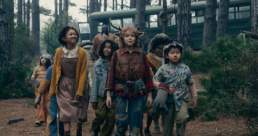Nonso Anozie as Jepperd and the hybrid children in Sweet Tooth.