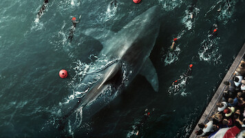 People swim around a giant shark in the Seine in 'Under Paris.'