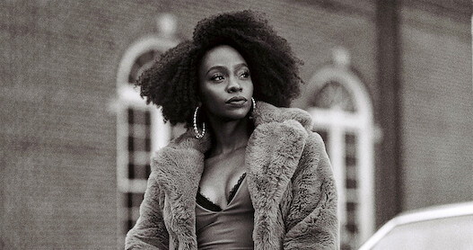 Teyonah Parris as Yo-Yo on the set of 'They Cloned Tyrone'