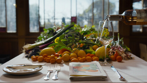 A table setting full of fresh ingredients